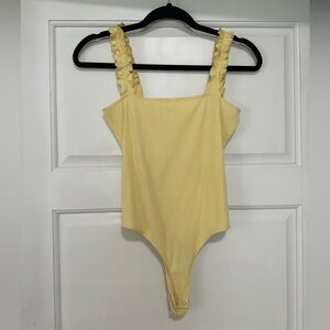 Double Zero Yellow Ruffled Bodysuit